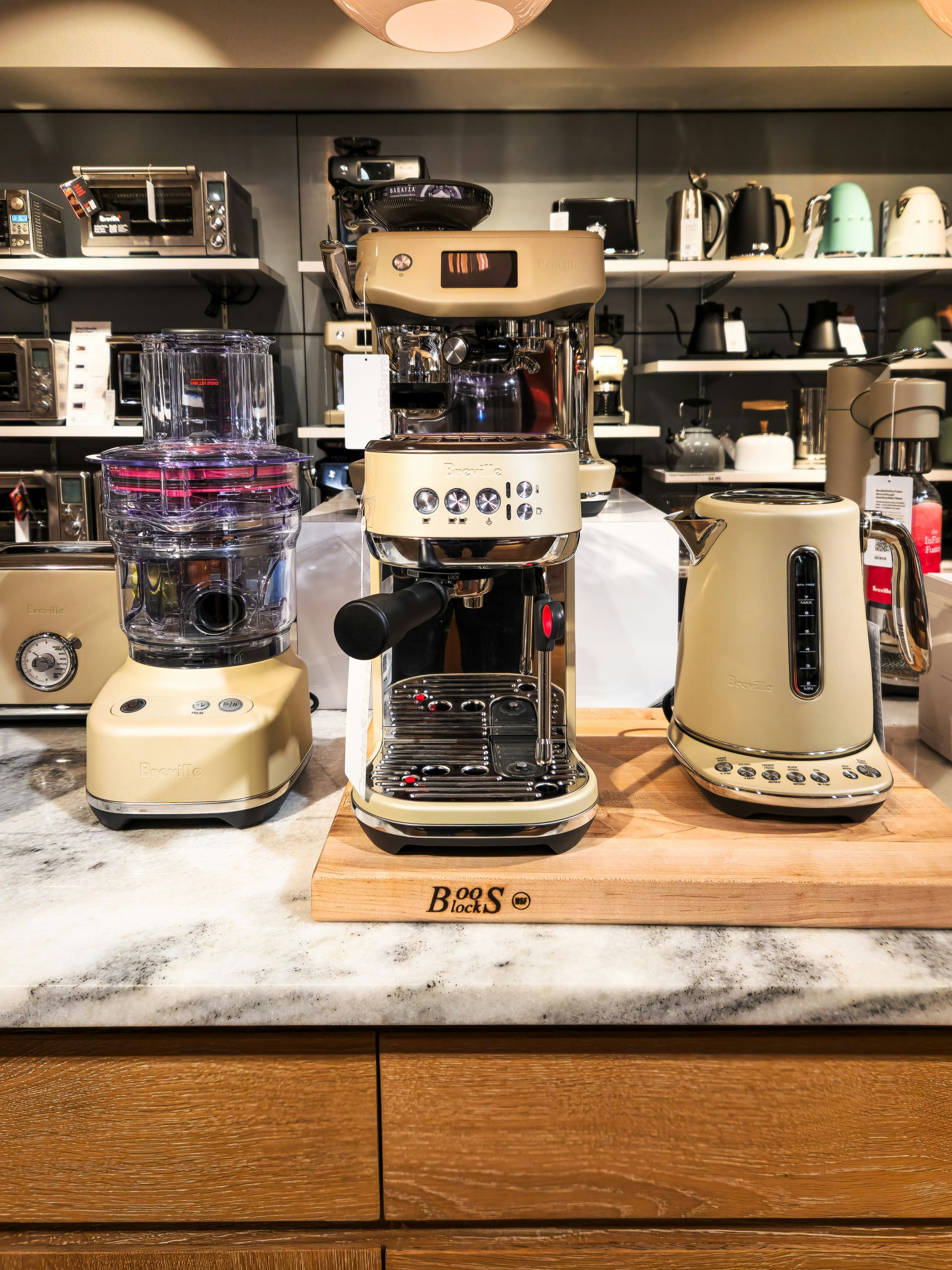 A counter top with a blender and other appliances on it